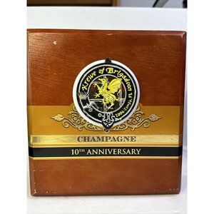Perdomo Reserve Champagne 10 Anniversary Cigar Box Crewe Of Brigadoon logo gaspe